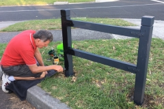 Preparing the Haldane Street corner posts for the new sign